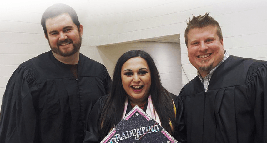 2015 graduate, Andde Mendez, with her instructors, Jim Gatfield and Johnny Rowing, at Commencement
