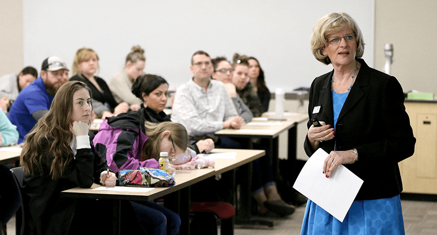 Connie Miller, President and CEO of Icon Credit Union, speaking with CWI students.