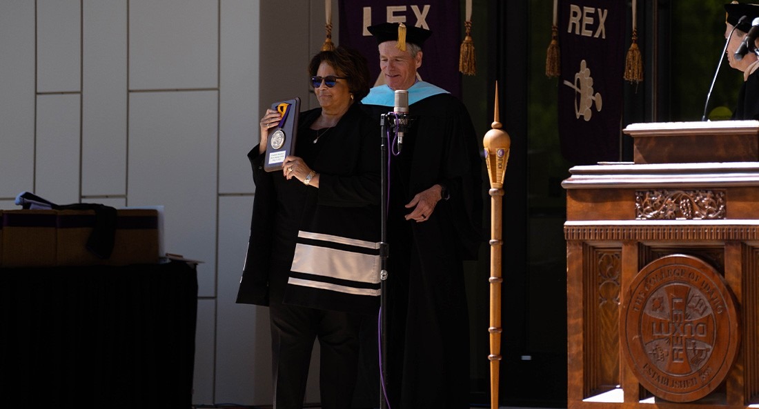 Cherie Buckner-Webb accepting College of Idaho's Presidential Medallion award