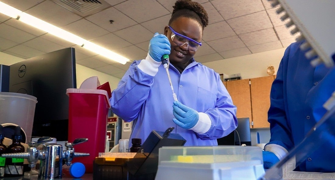 INBRE scholar working in the lab